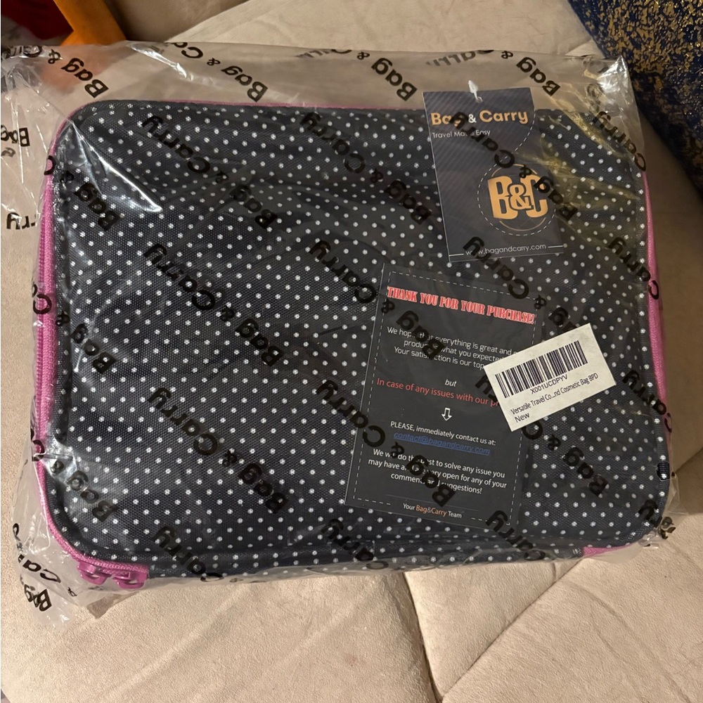 Chic Black Polka Dot Cosmetic Bag with Pink Zipper